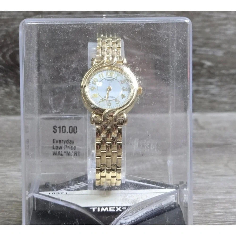 Vintage Timex Women's Gold tone Round Swirl Watch T119 White Dial 30M Old Stock